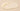 Close-up of a smooth, beige-colored balm on a matching background