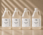 Four bottles of VISH Niacinamide Serum on a beige background