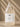 Large bottle of VASH Niacinimide Serum on a beige background
