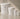 Set of Vash Beauty Labs Vegan Lip Balm Base containers on a neutral background